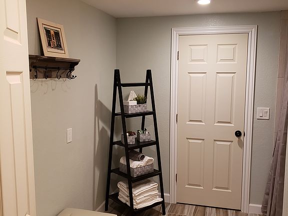Master bedroom doorway to priavte bath.