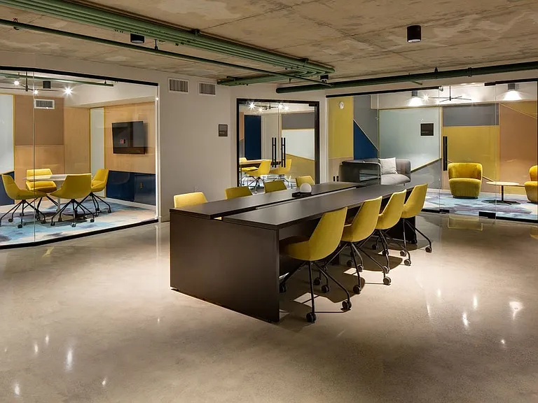 Chill lounge with common area seating and breakout rooms