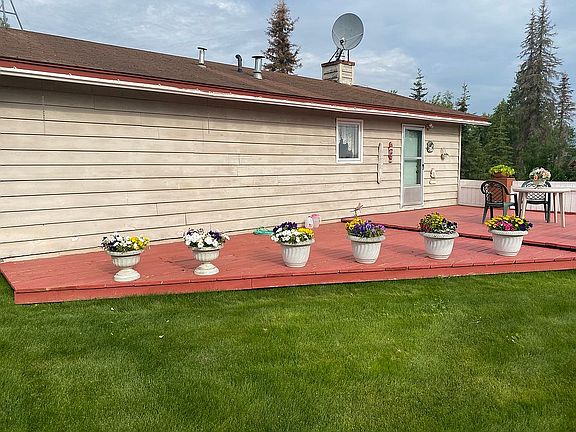 Fenced yard large deck