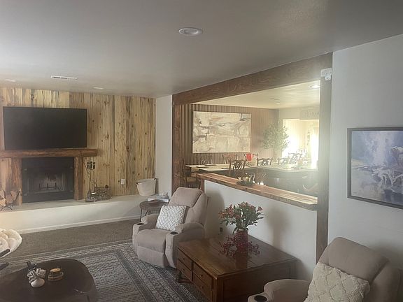 Living room with open wall to the Kitchen