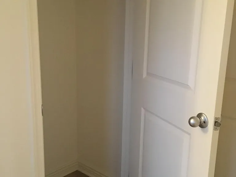 Closet by the entrance from the garage for jackets and shoes or for additional storage space.