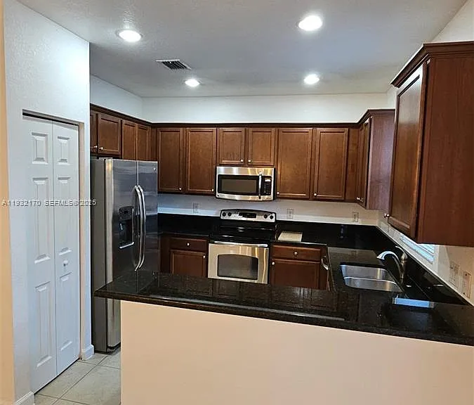 8785 NW 116th Ct — Photo 2
