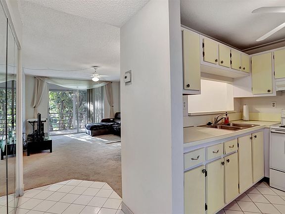 3rd image of 9151 Lime Bay Boulevard #302