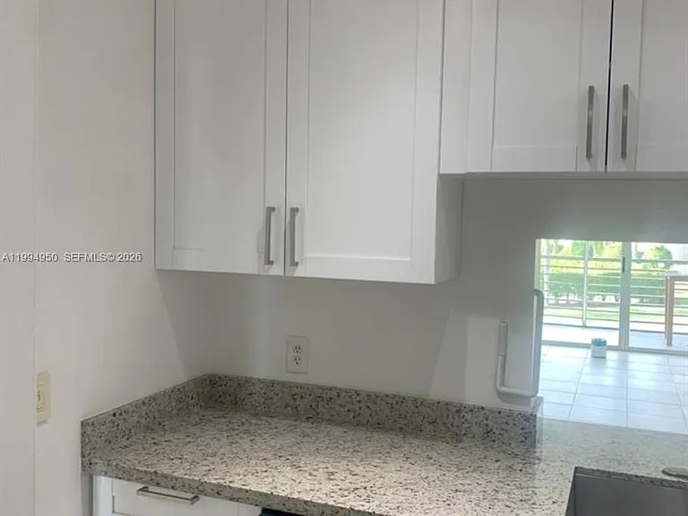 7435 Woodmont Ter #202 — Photo 10