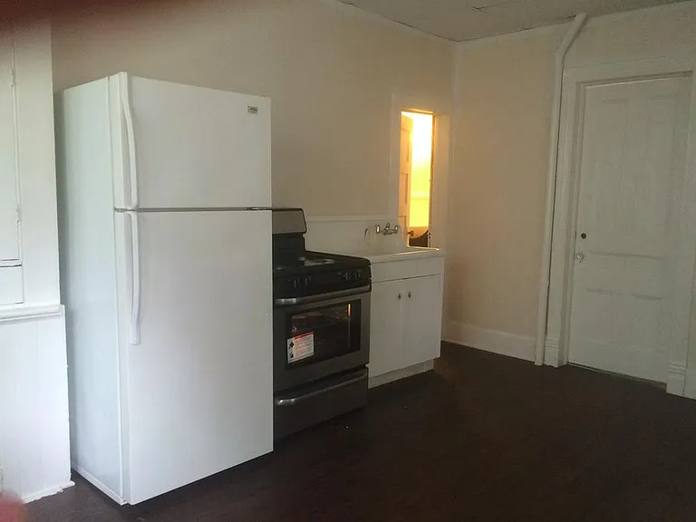 Kitchen, looking from front entryway.