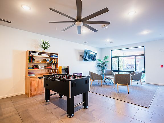 Club room includes foosball and a variety of books and games.
