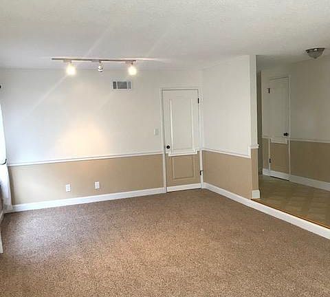 Living Room Looking Toward Kitchen and Family Room