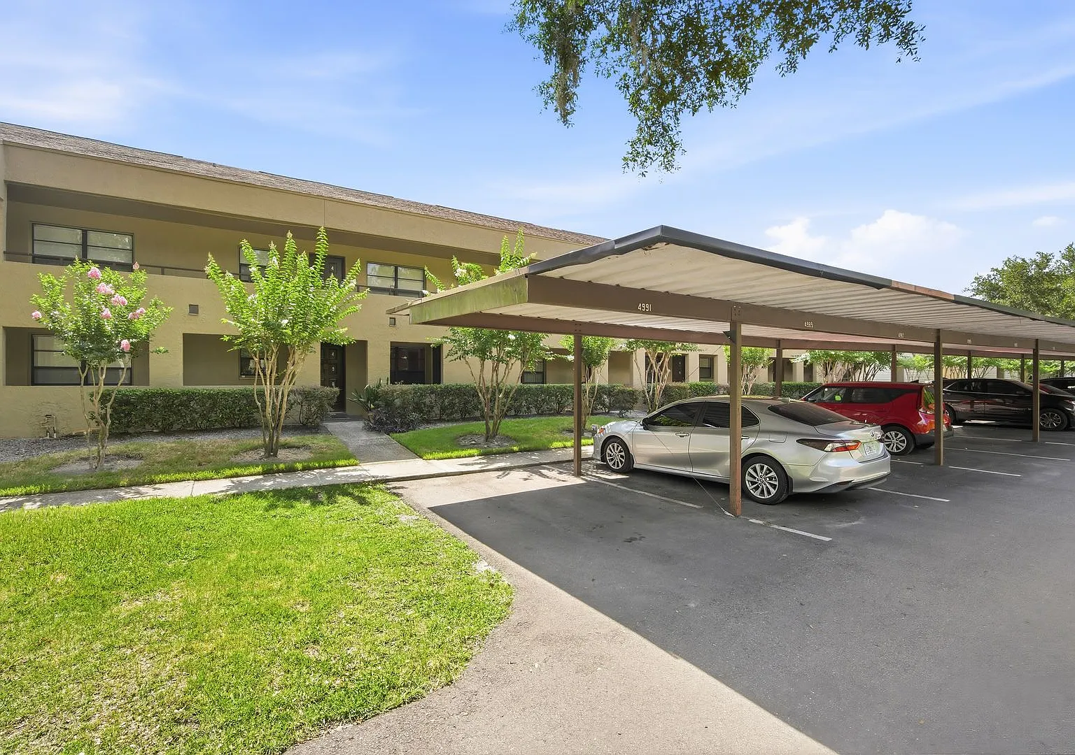 Spacious 2BR / 2BA Condo with Pool View in Guard-Gated River Oaks Community! — Photo 2