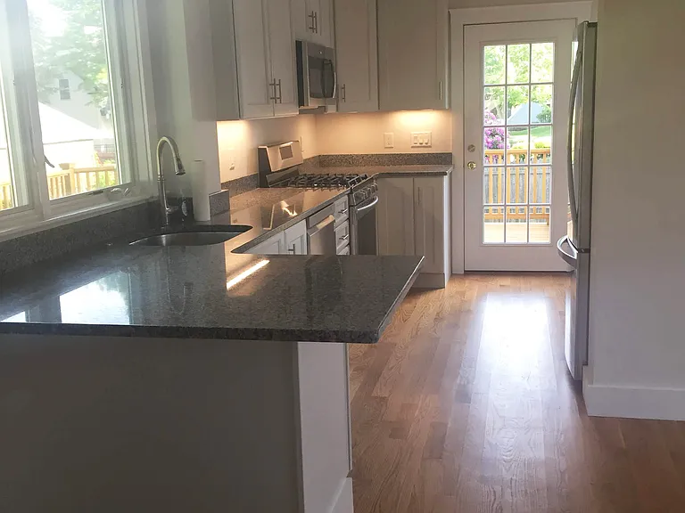 Kitchen looking towards backdoor