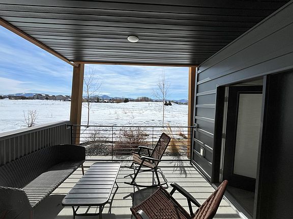 Park view from patio (cushions are stowed; propane porch heater included but out of view).