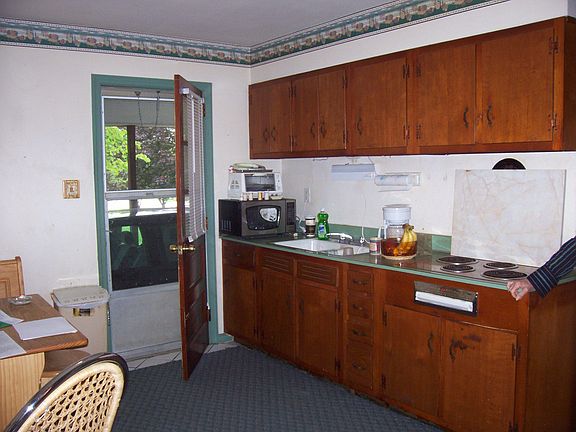 Kitchen leads to Carport
