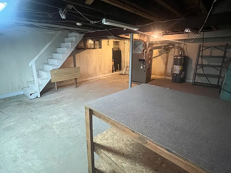 Basement with utilities, but this space is not included.