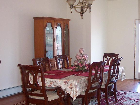 Formal dining room; French doors to right of picture lead to back deck.