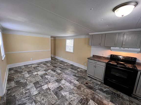The cabinets are all new paint along with a new backsplash.