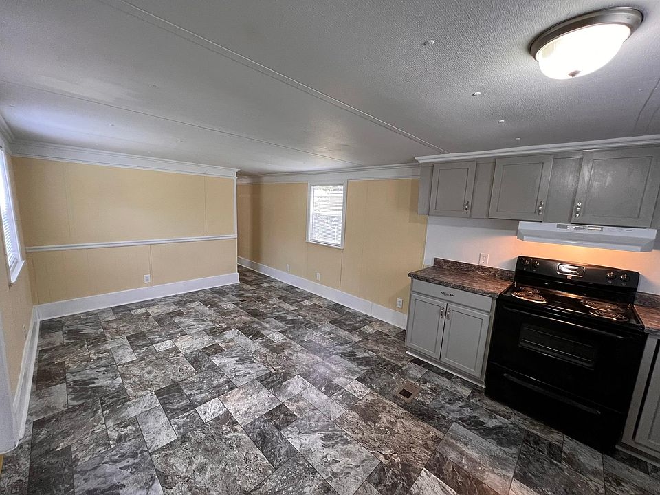 The cabinets are all new paint along with a new backsplash.
