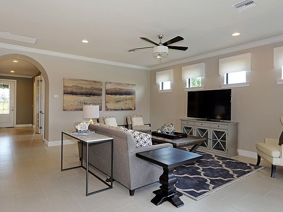 Model Representation Gathering room with plenty of entertaining space and porcelain tile floors