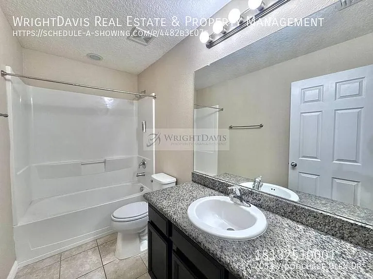 7083 Woodchase Glen Dr — Photo 22