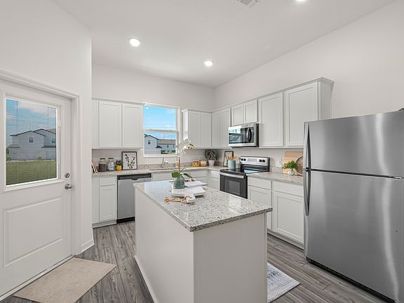 This move-in ready home features gorgeous granite countertops in the kitchen