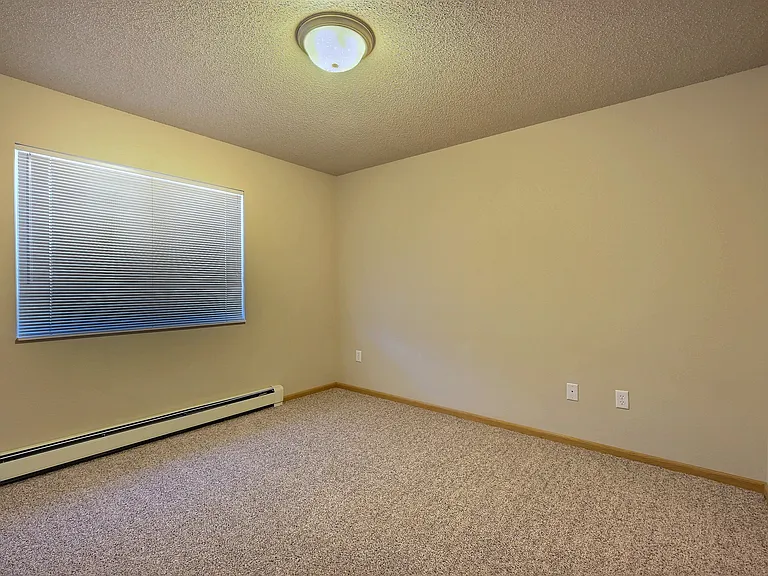 Fargo, ND East Bridge Apartments | Bedroom
