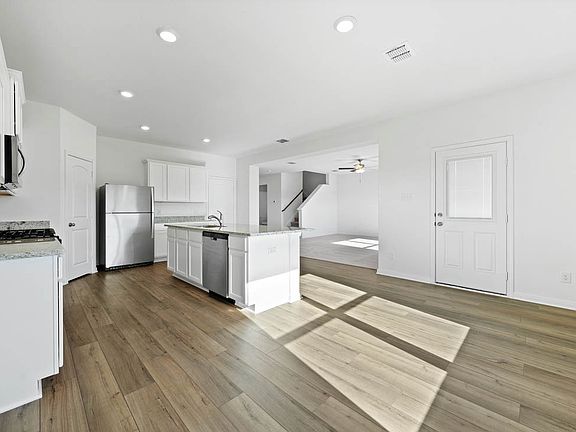 The spacious kitchen is perfect for preparing your family s favorite meals and treats.