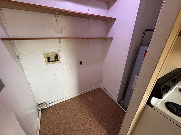 Utility room with laundry hookups