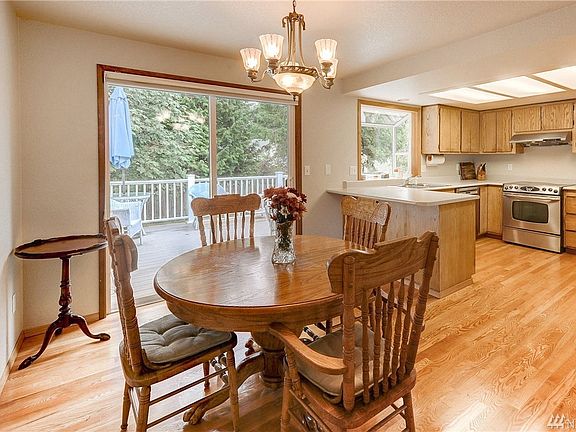 Open kitchen and dining area perfect for visiting while you cook!