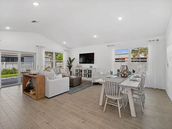 Open floorplan with high vaulted ceiling