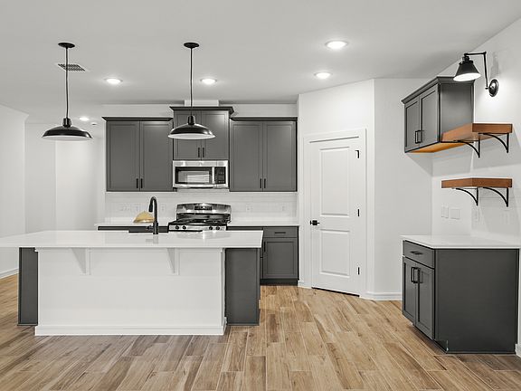 Kitchen with floating shelves