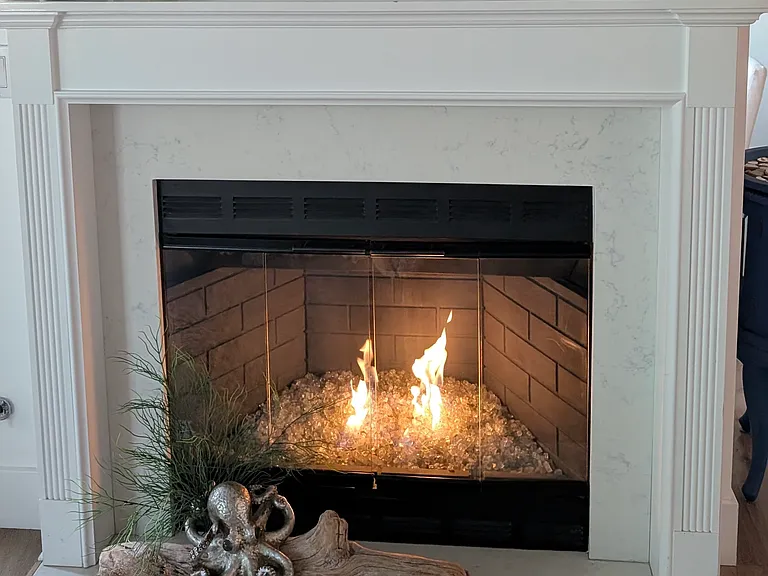 Rejuvenating coastal calm: mesmerizing fireplace glow, healing nature retreat.