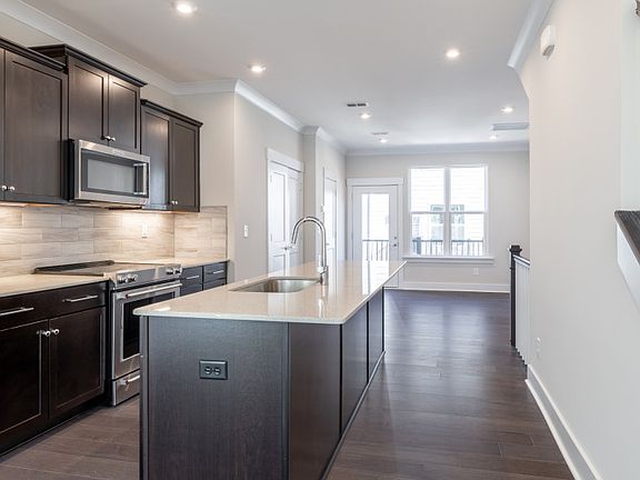 Kitchen with Large Island and Stainless Steel Appliances