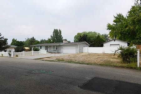 RV pad is behind fence
