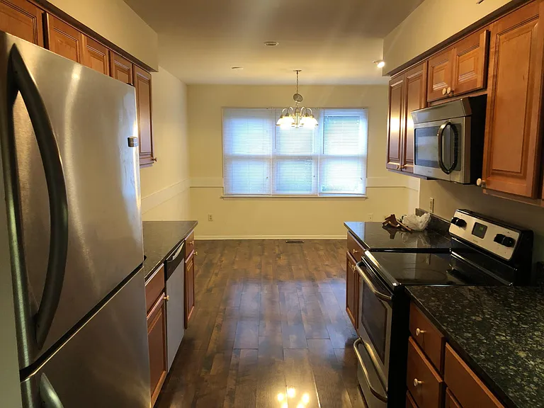 Updated Kitchen with Granite counter tops and Stainless steel appliances