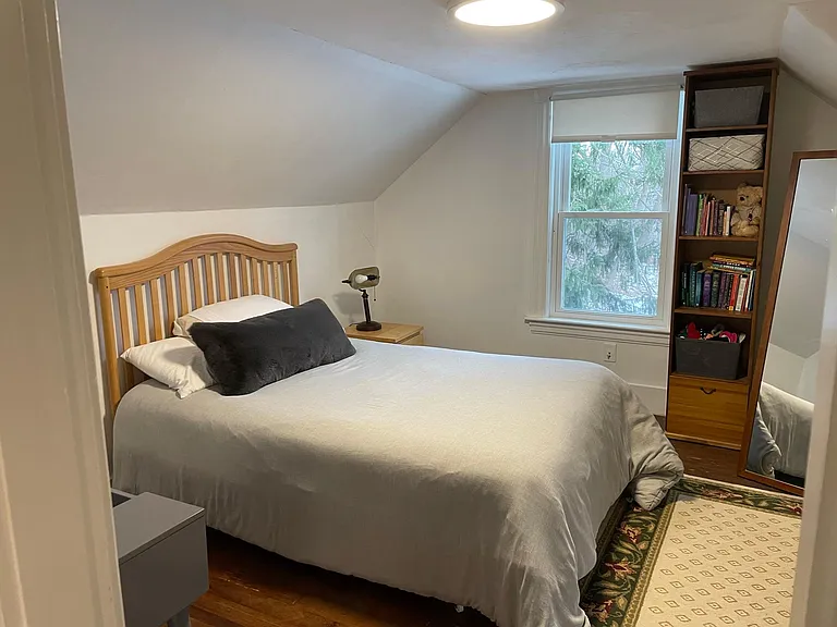 Attic room used as a bedroom (furniture not included)