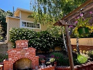 Cottage view of front kitchen window