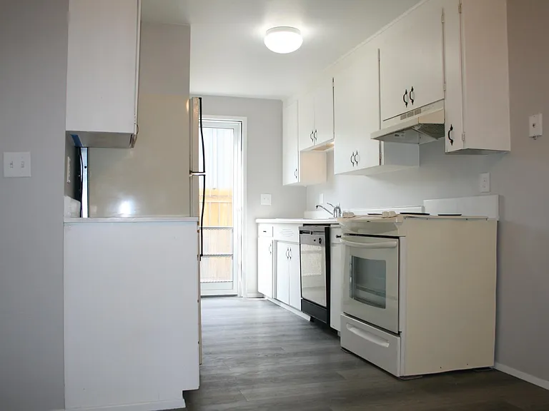 Kitchen & Open Patio Door