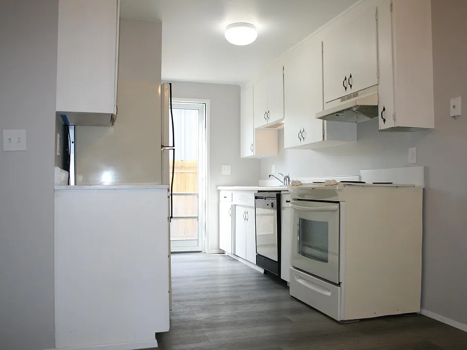 Kitchen & Open Patio Door