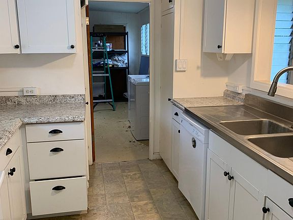 Kitchen with access to shared laundry.