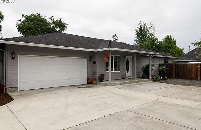 Driveway to front. Behind gated area is Rv Parking