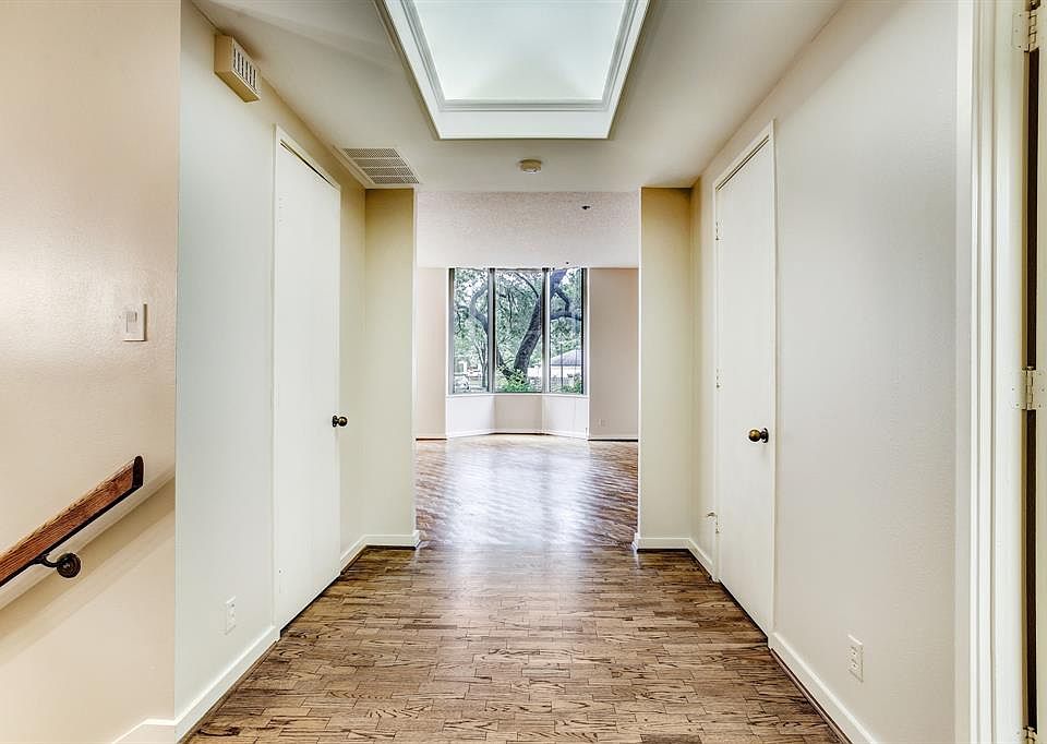 The 12x8 Entry Hall shows the stairs leading to the bedrooms and the lovely greenery outside.