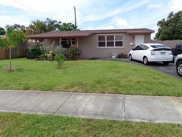 1st image of 820 NE 58th Ct