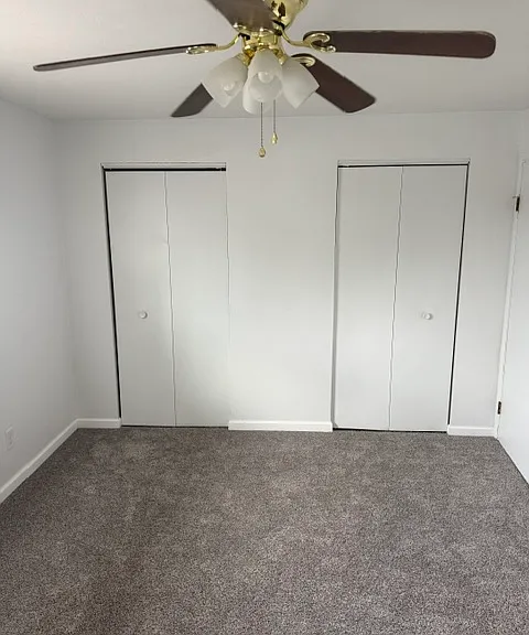 BEDROOM 1 WITH TWO FULL CLOSETS