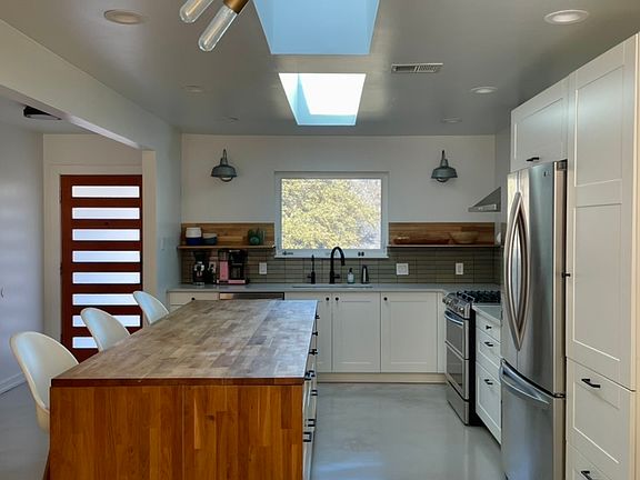 Bright eat-in kitchen with ample storage