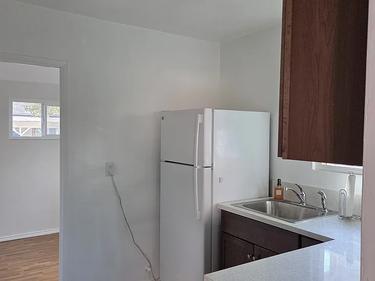 View facing back bonus room that can be used as an office for storage.