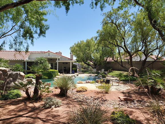 1/3 Acre Lot! Separate rod iron fenced off area . Rear wall backs up to dead end street