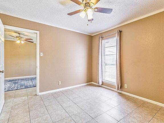 CERAMIC TILE IN THE BEDROOMS! AND CEILING FANS IN EVERY ROOM!