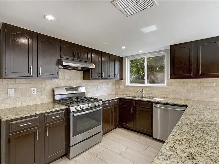 Kitchen with Granite Countertops, Gas Stove & Double SS Sink