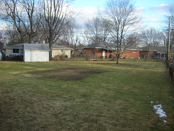looking from the west corner of the home toward the backyard
