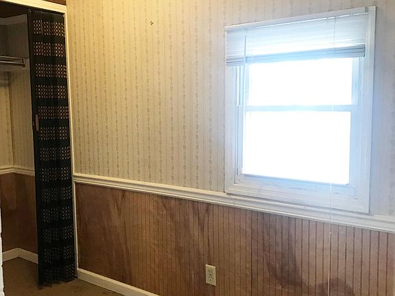small bedroom space with closet