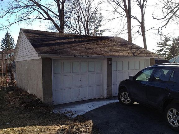 Detached 2-car garage (with one opener on left door)