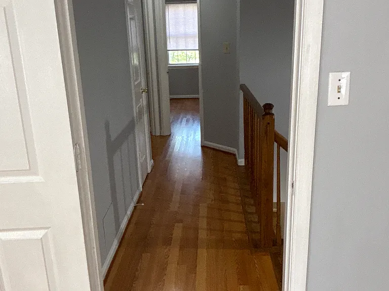 Hall way conncecting Master to second and third bedrooms